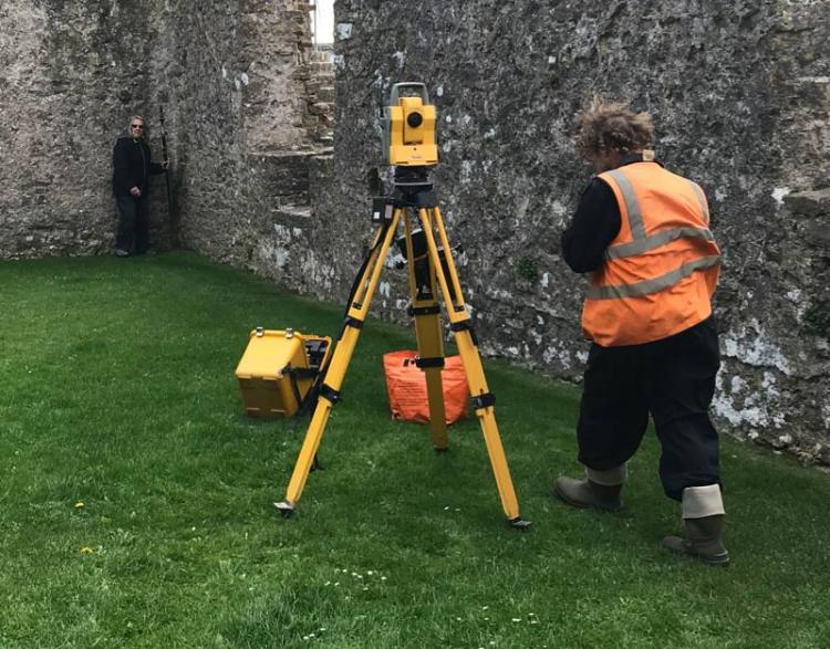 Hazel and Hubert surveying the wall lines to complete our topographic survey of the castle